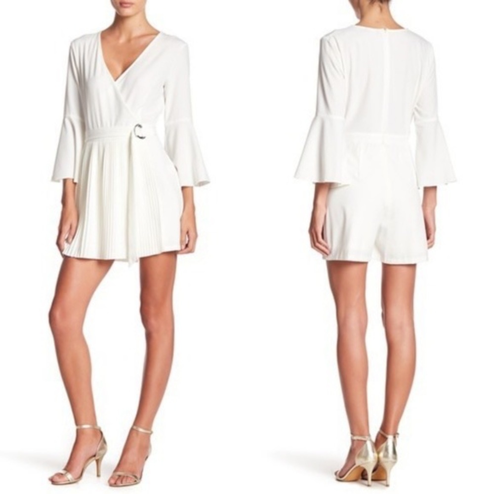 bebe White Wrap Romper with Pleated Skirt and Bell Sleeves